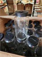 Box of jars with lids (cutout on lids)