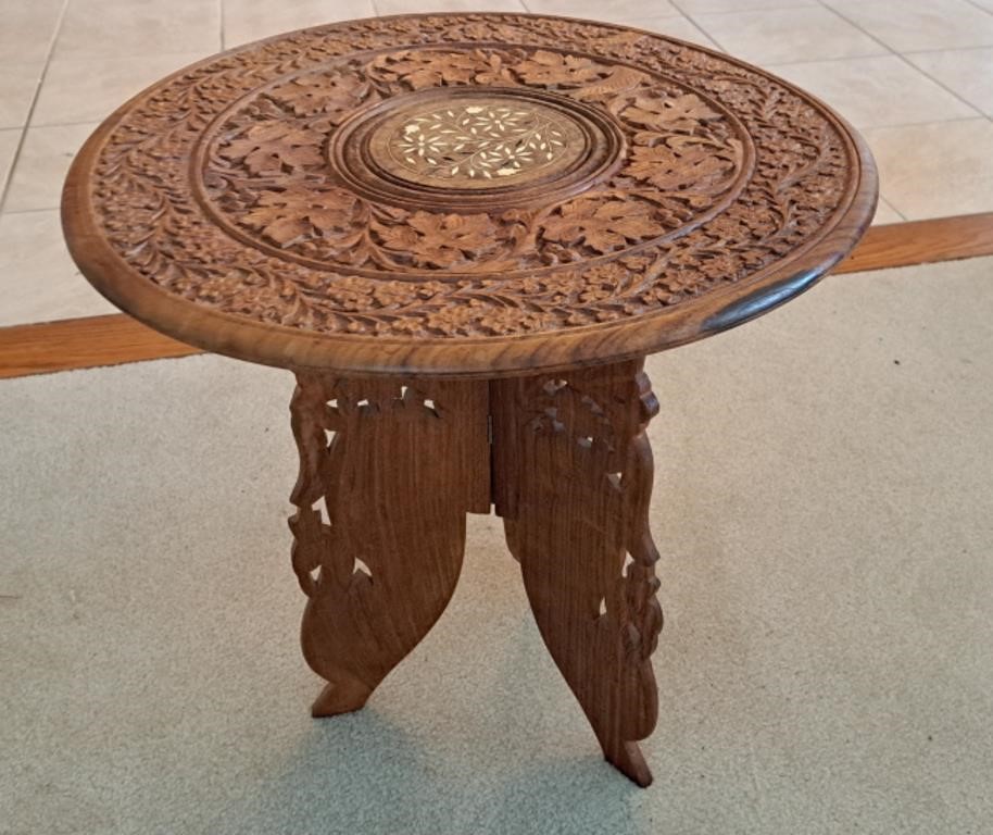 Hand Carved folding side table. 17 1/2" l x 17