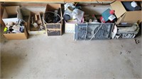 Shelf of tools, bird houses and household items