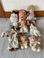 Group of 1980s era dolls and stuffed animals