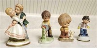 4 assorted porcelain figurines