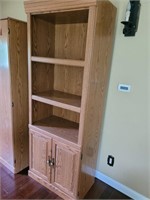 Sauder-like cabinet with shelves and doors