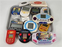 ASSORTED LOT OF HAND HELD GAMES