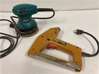 Palm sander and electric stapler. Both work