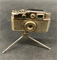 Vintage desktop lighter in shape of a film camera