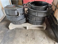 Pallet with oil pans, plastic crate with contents