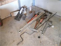 Trowels And Pipe Wrenches
