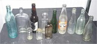 {12} Vintage Bottles