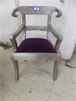 ORNATE EMBOSSED METAL ARM CHAIR WITH RAM'S HEADS