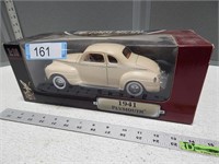 1941 Plymouth replica in original box; 1/18 scale
