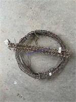ROLL OF BARBED WIRE AND GOUCHO WIRE DISPLAY