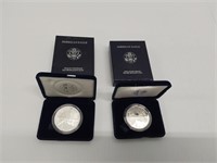 (2) silver Eagles in cases