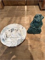 plaster bird wall hanging and frog statue
