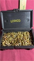 Assorted Remington cartridges in container