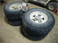4 Goodyear Duratrax tires on American Racing rims
