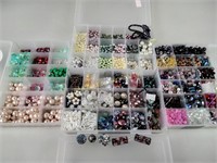 4 organizers filled with craft beads