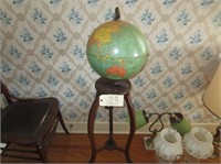 Old world globe on ornate stand