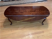 Cherry finish drop leaf coffee table