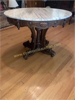 Heavily carved Victorian marble top parlor table