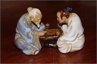 Chinese mudmen figurine