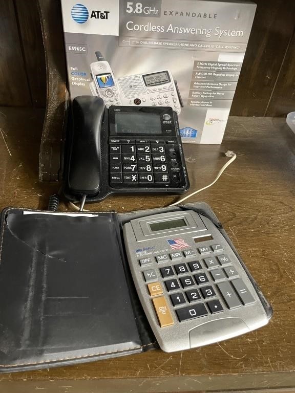Two phone systems (land line) and calculator
