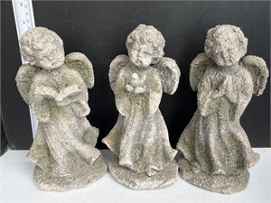 3 concrete angel figures