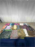 Assortment of higher end fabric with miscellaneous