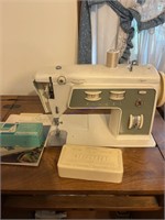 Stylist, zigzag, sewing machine with cabinet