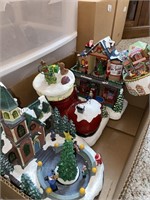 Box of Christmas village pieces