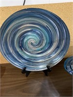 Two blue decorative bowls with stands