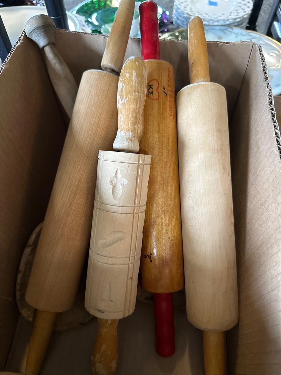 Assorted wooden rolling  pins  and more