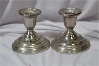 A Pair of Sterling Candlesticks