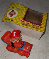 Vintage Fire Chief Police Car Wind Up Toy