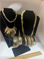 Gold type necklace and bracelet jewelry collection