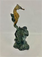 Brass and bronze sea horse statue.