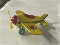 Vintage yellow metal Disney airplane