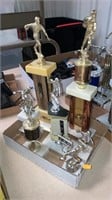 7 bowling trophies