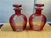 Pair cranberry wash decanters with etched design