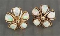 Pair tested 14k gold earrings set with opals: