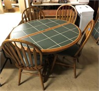 Oak table w/title top extra leaf & 4 Chairs