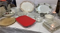 Shelf full of misc kitchen - platters, Pyrex