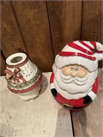 santa claus cookie jar and candle light