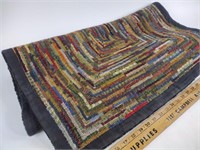 Colorful area rug-50 inch x 26in. Some frayed
