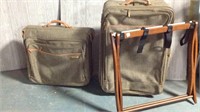 Tweed luggage and wood luggage rack