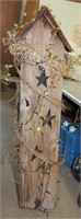 Wooden decorative piece with stars, 54" tall;