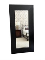 An IKEA Floor Mirror 74.5"H x 37"W x 2"D