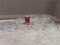 Pyrex clear glass casserole dishes with lids. 2