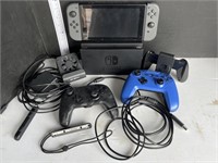 Nintendo Switch console w/ controllers, cooling