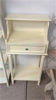 Small white table with drawer