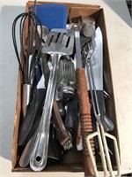 Box full of kitchen utensils a little bit of